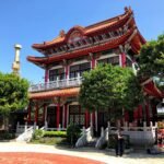 red and white temple under blue sky during daytime